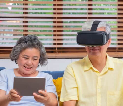 A senior couple use AI and other technology