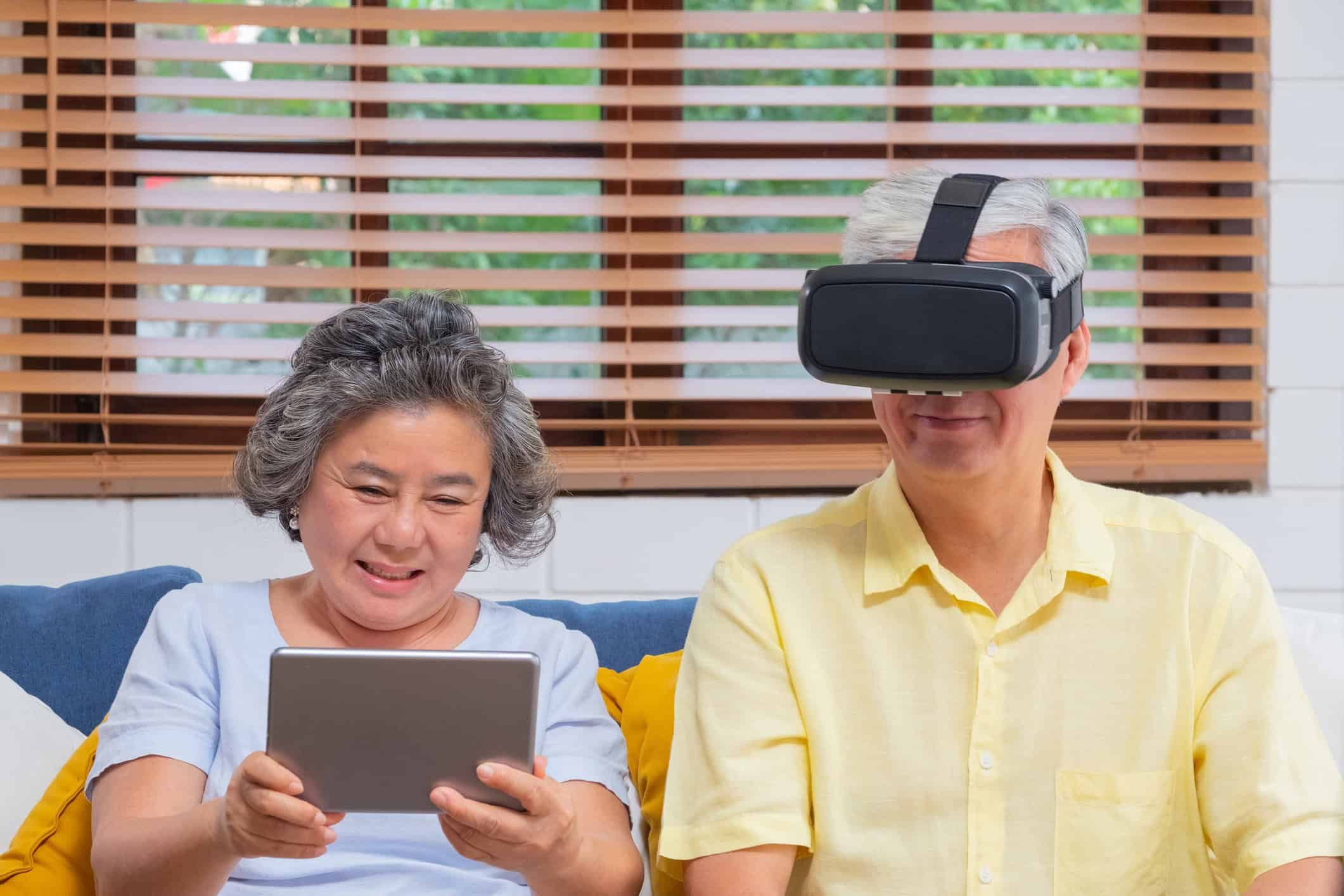 A senior couple use AI and other technology