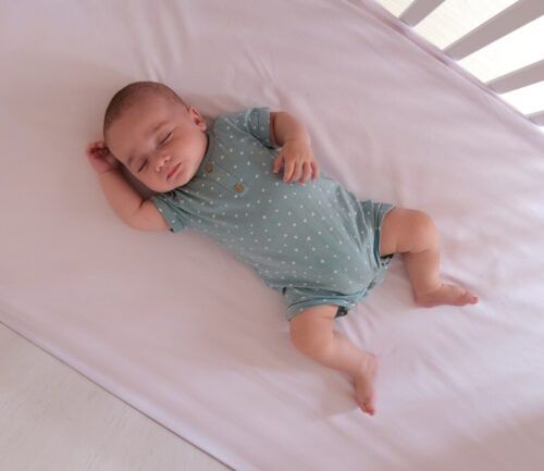 baby sleeping in crib