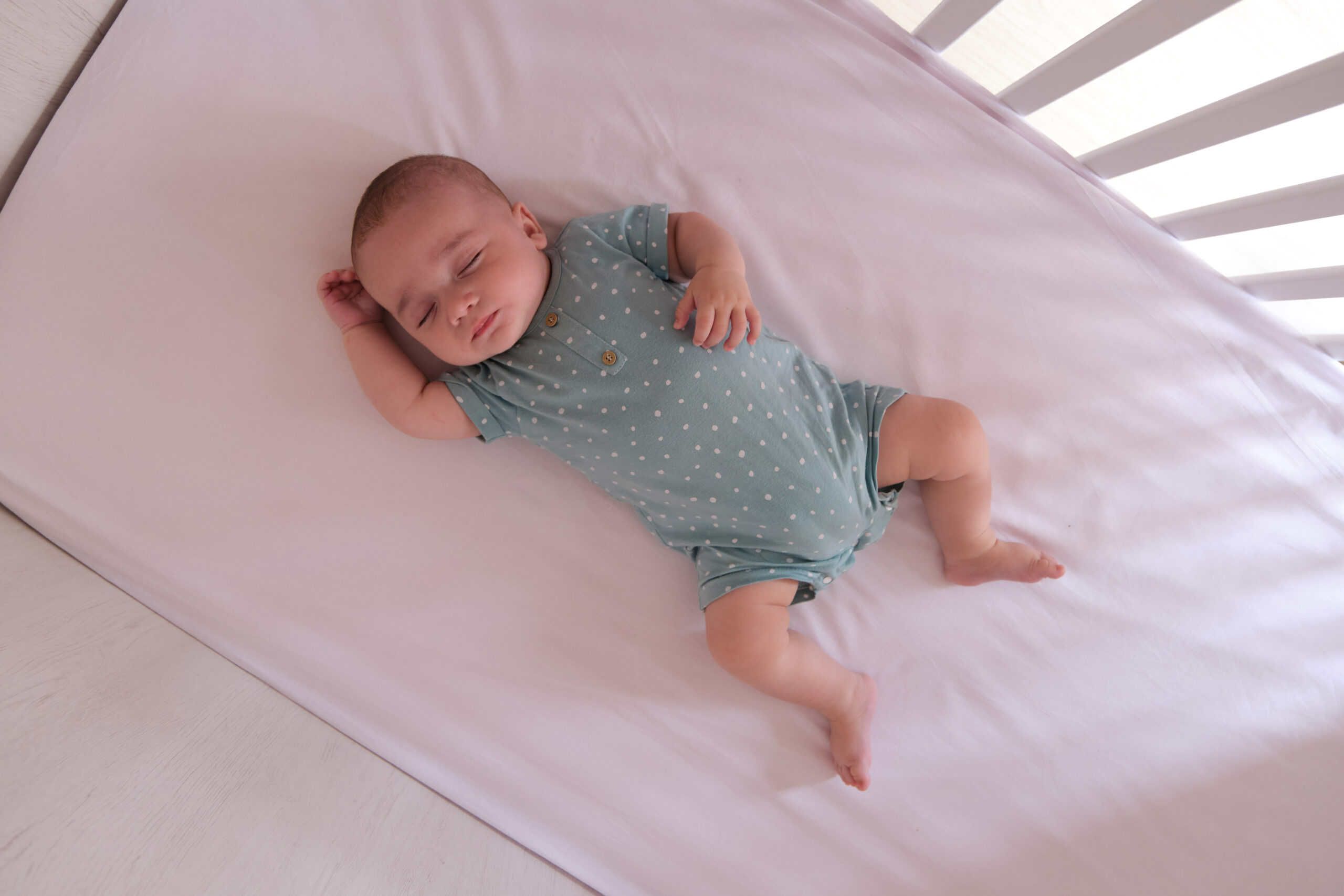 baby sleeping in crib