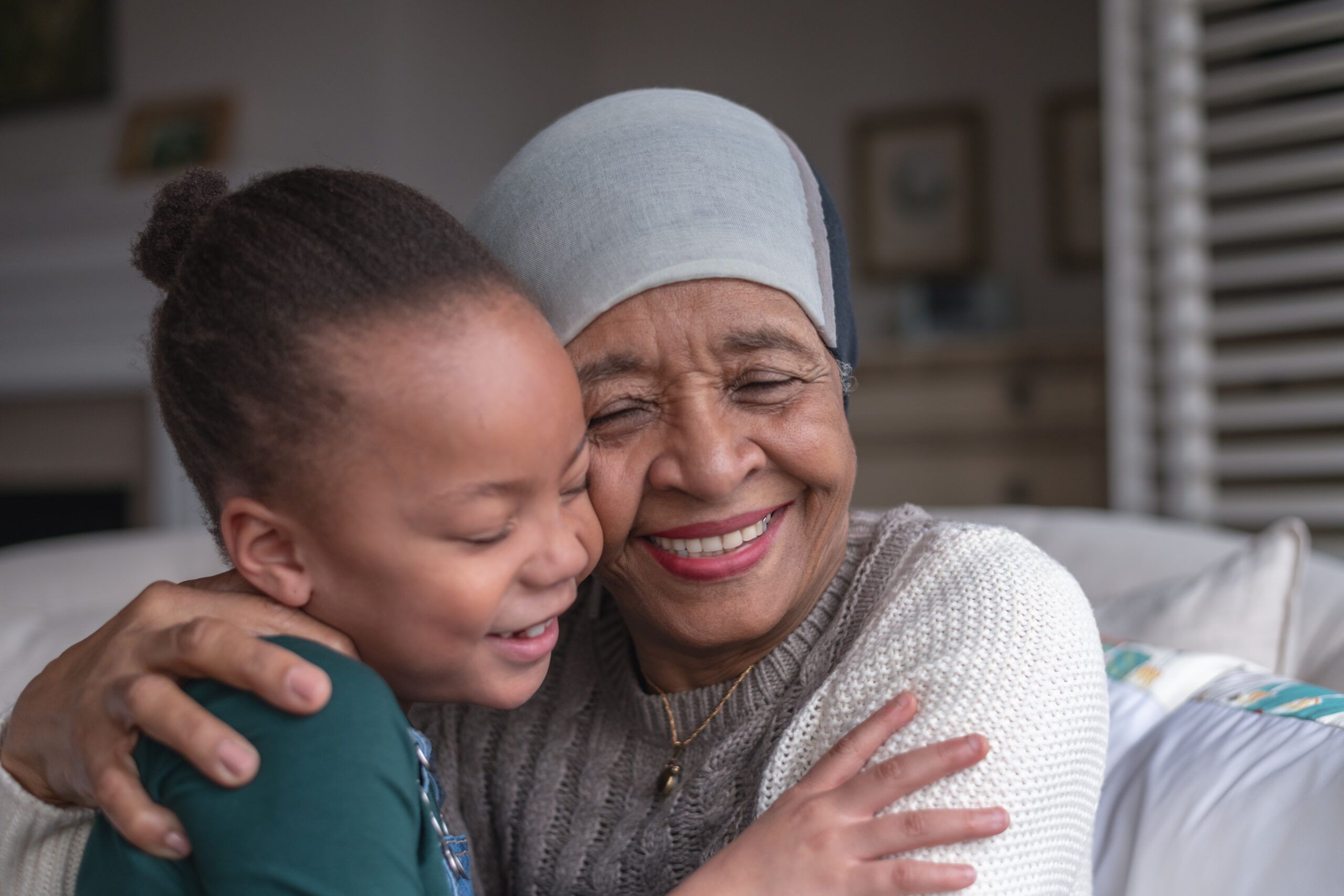 Woman with cancer spending time with her granddaughter