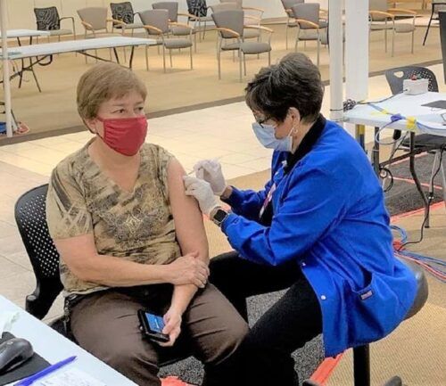 Mary getting covid shot