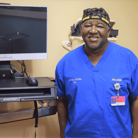 Dr. Frasier in exam room.