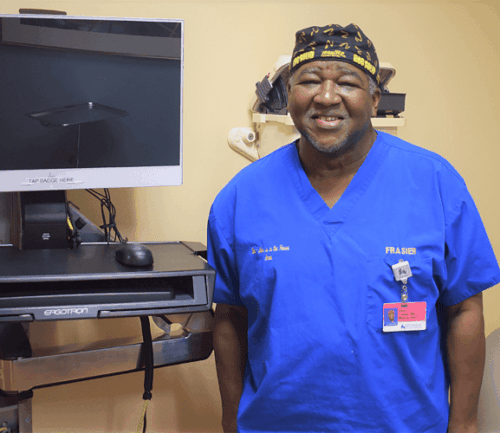 Dr. Frasier in exam room.