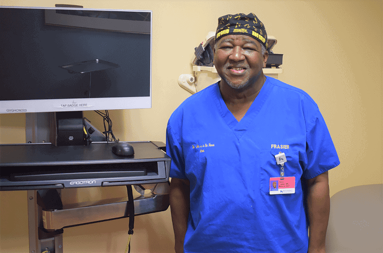 Dr. Frasier in exam room.