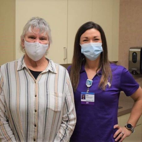 Robyn poses with her pelvic floor therapist Kate