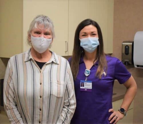 Robyn poses with her pelvic floor therapist Kate