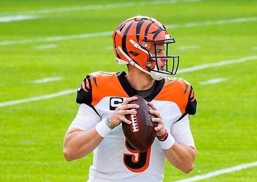 Joe Burrow, recently had appendicitis, throws a football