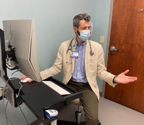 Doctor talks to patient about vertigo