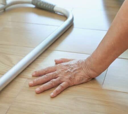 person on ground with walker, fall prevention awareness