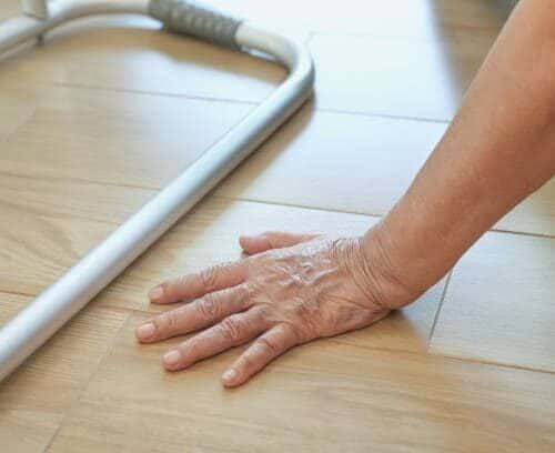 person on ground with walker, fall prevention awareness