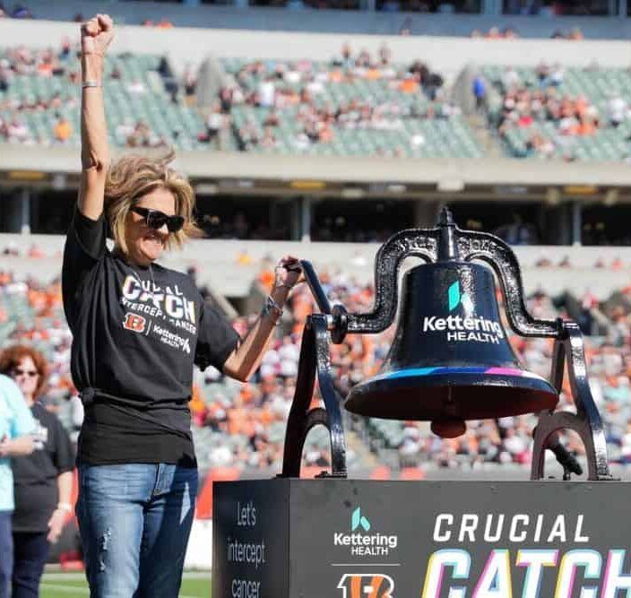 Cancer survivor rings bell at Crucial Catch Bengals game
