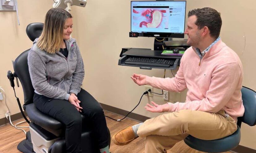 Dr. James Parker talking to patient about LINX