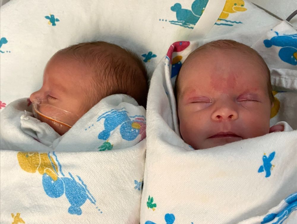 Heather Rainey's twin babies swaddled at the hospital