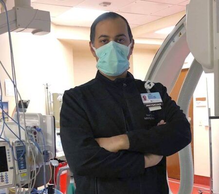 Dr. Bhirud poses in lab