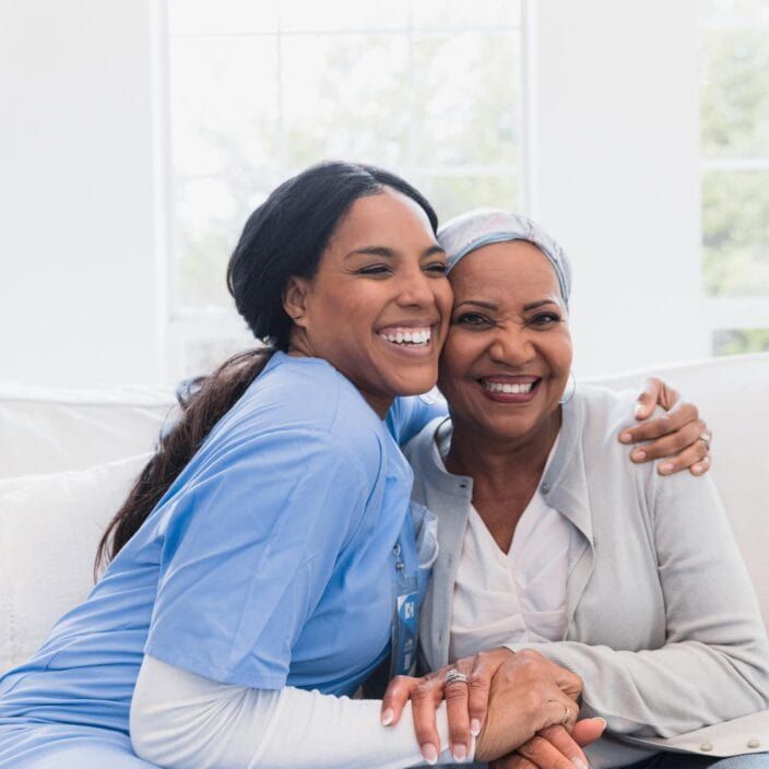 Elderly woman enjoys her nurse