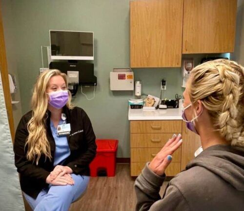 Dr. Caldwell OB-GYN talks to patient