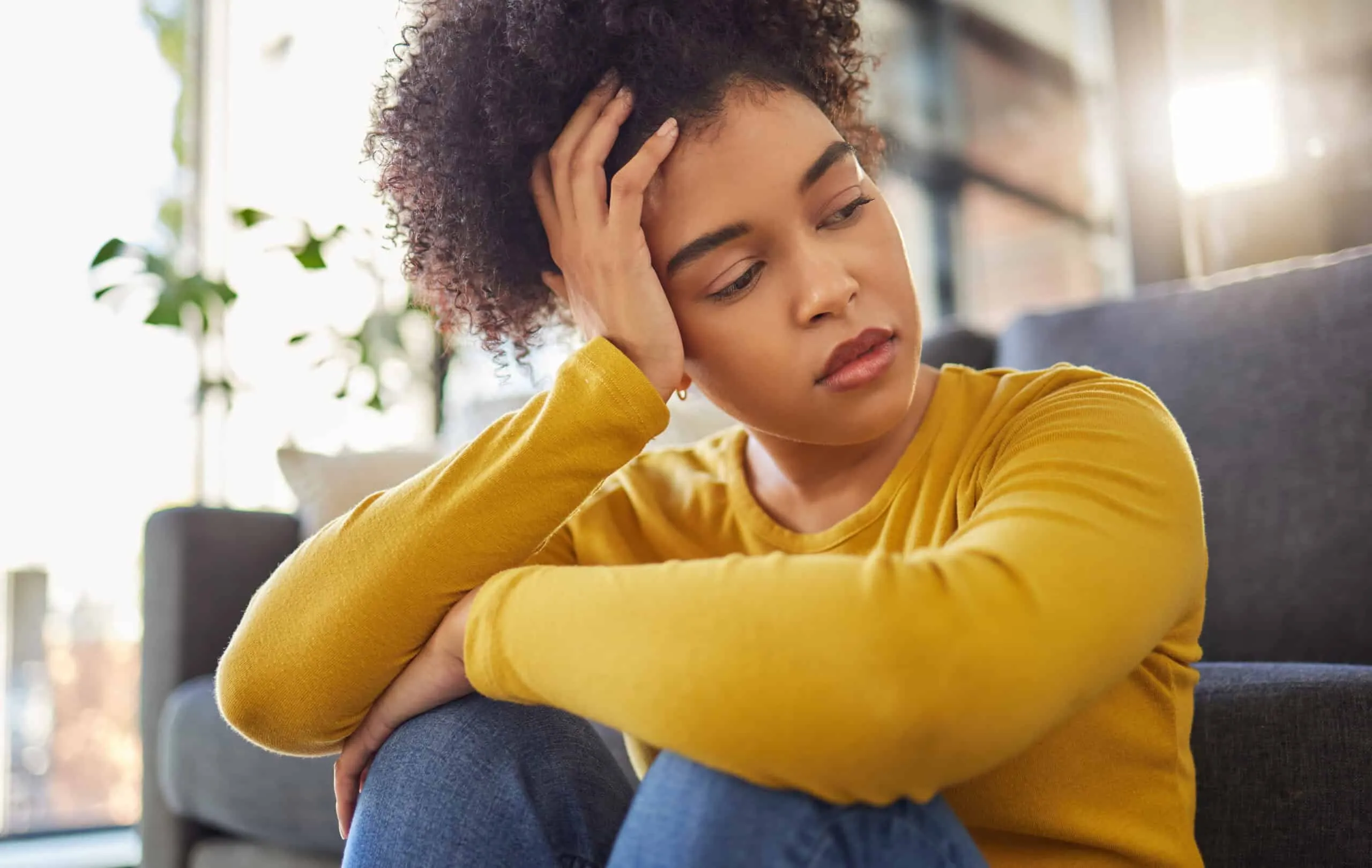 young woman looking sad
