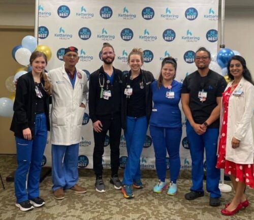 Doctors pose for a picture at their celebration for their three star rating for CABG procedures