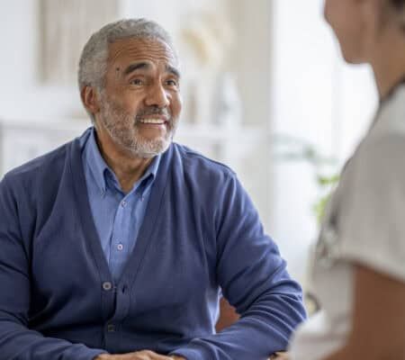 Man talking to a nurse