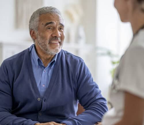 Man talking to a nurse