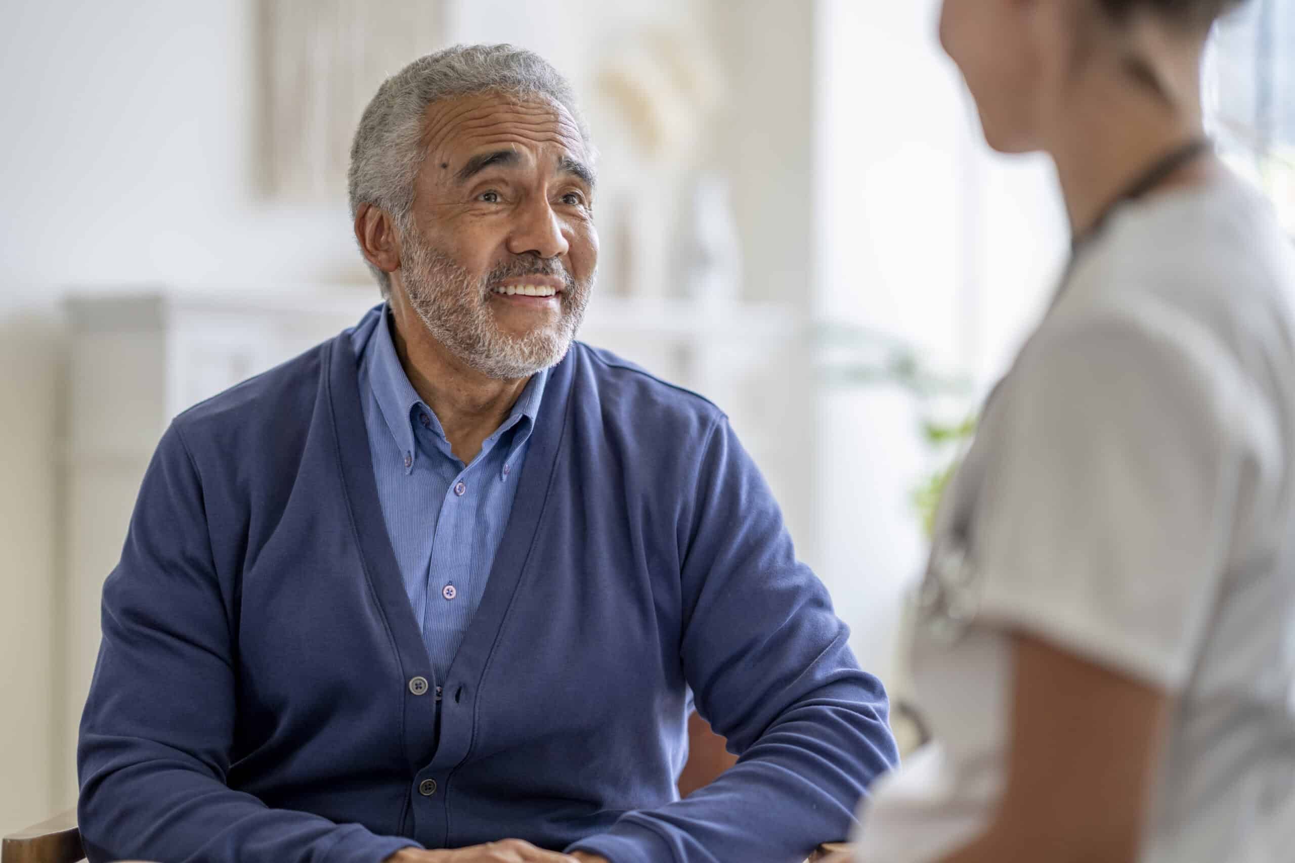 Man talking to a nurse