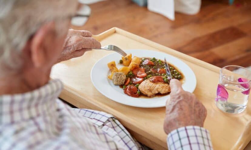 Man eating dinner at home