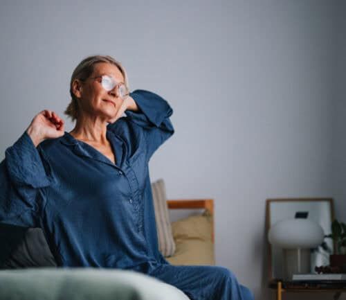 Woman stretching in the morning after sleeping