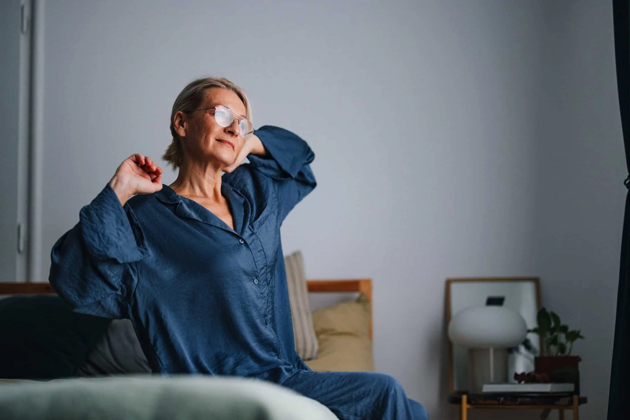 Woman stretching in the morning after sleeping