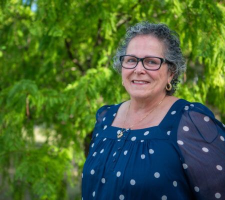 Nancy Herting outside smiling at camera