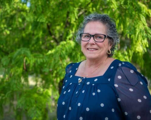 Nancy Herting outside smiling at camera