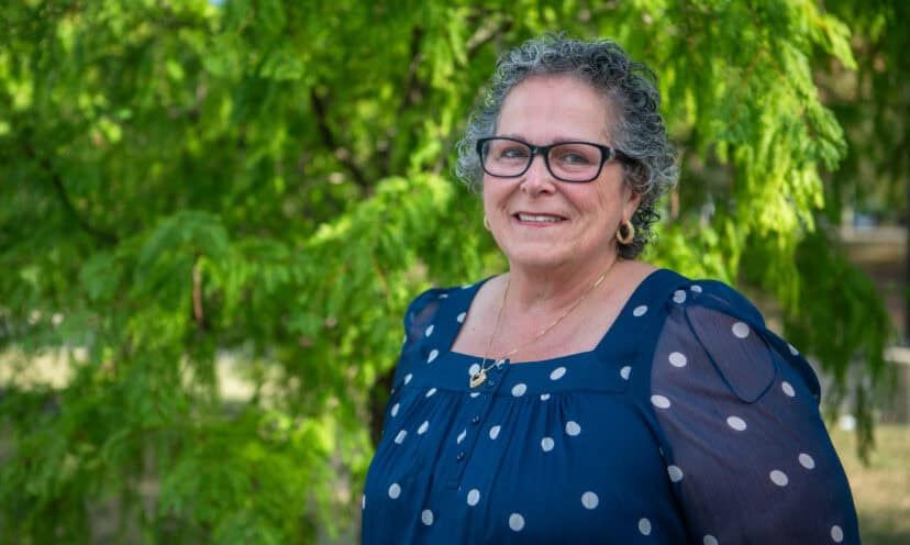 Nancy Herting outside smiling at camera