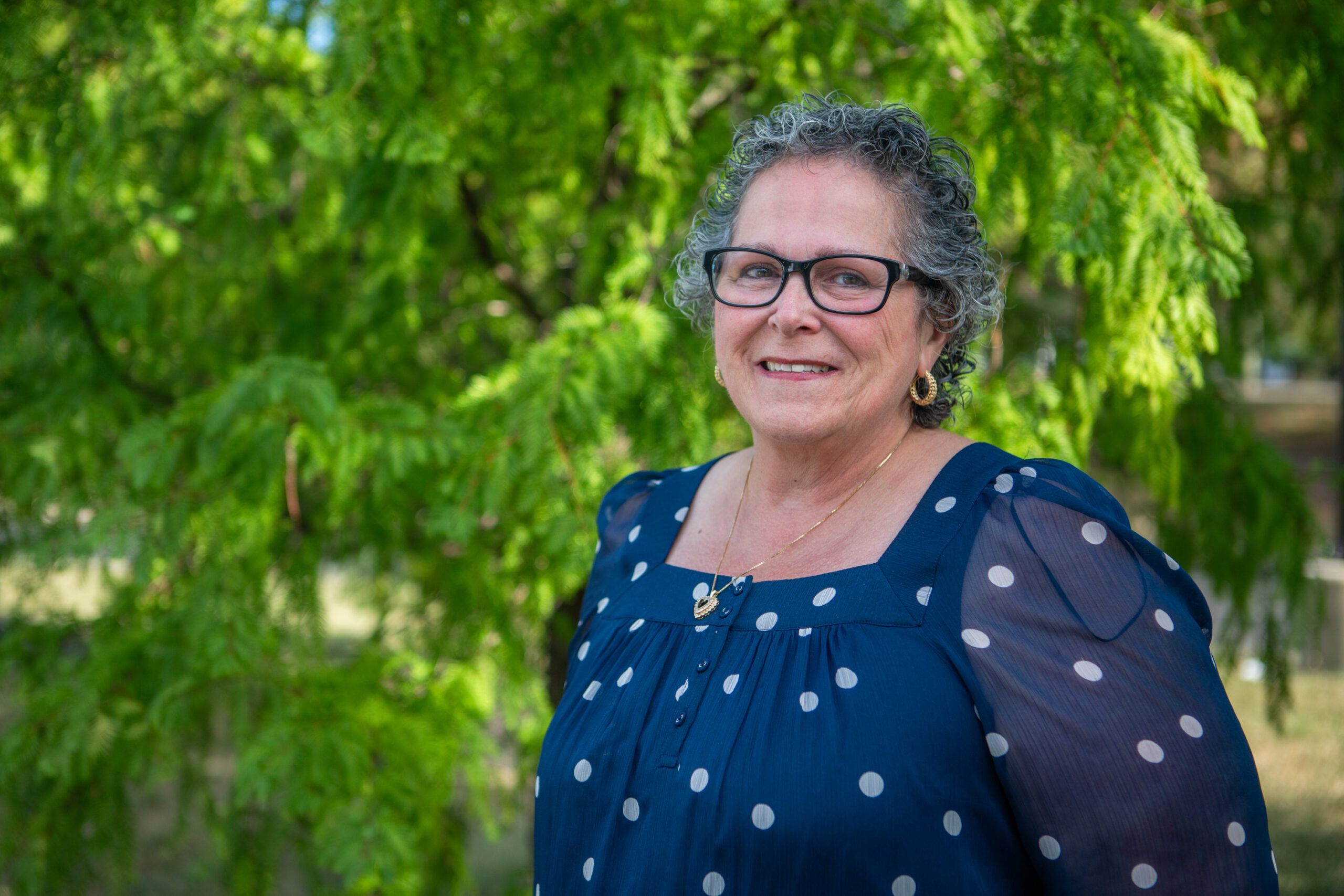 Nancy Herting outside smiling at camera