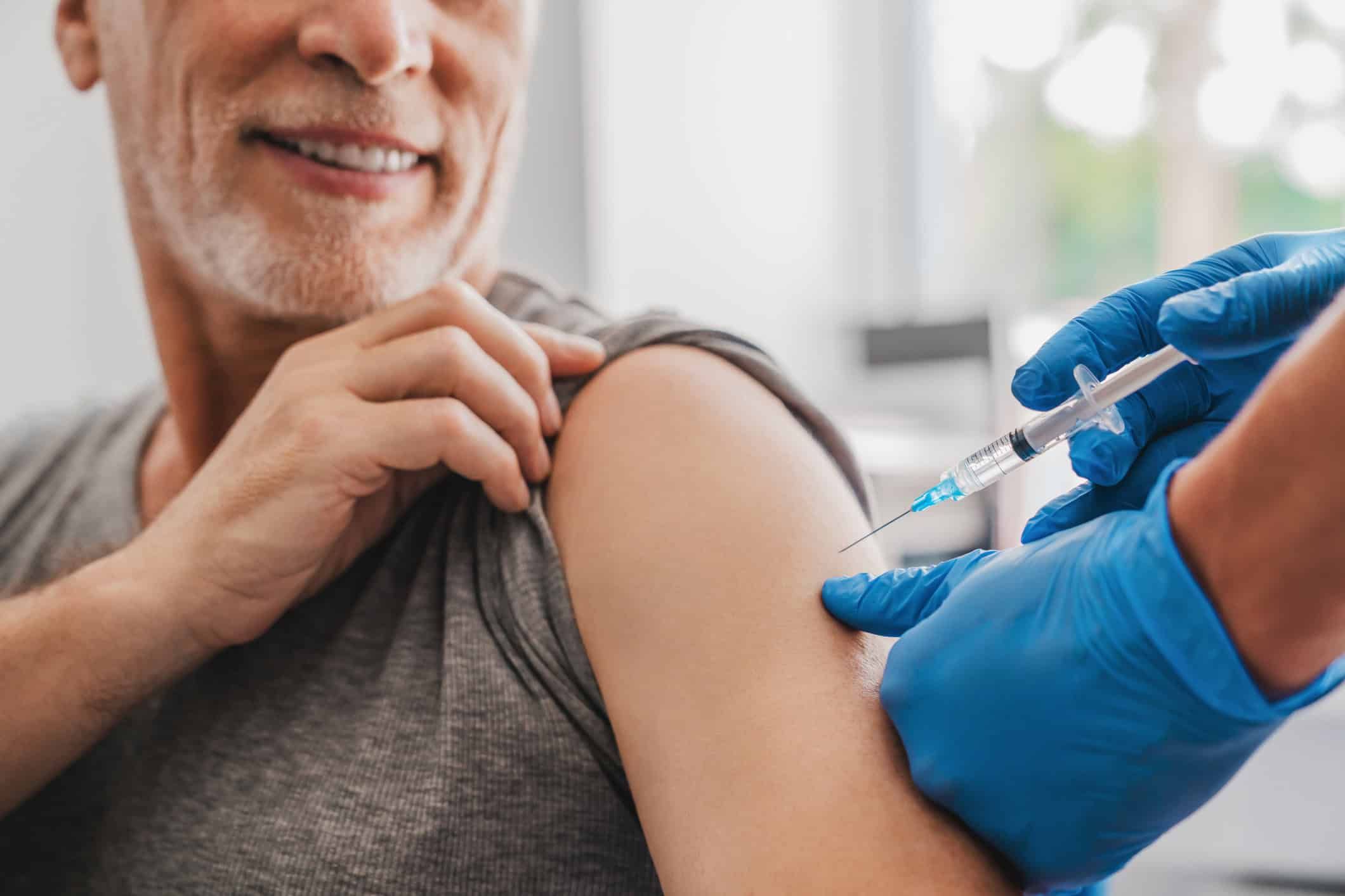 man getting a vaccine