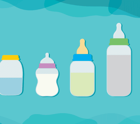 Bottles with different colors of breast milk