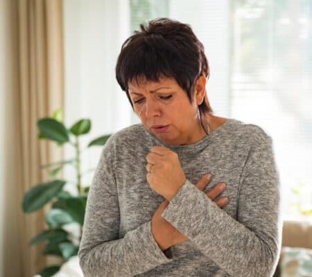 Woman coughing