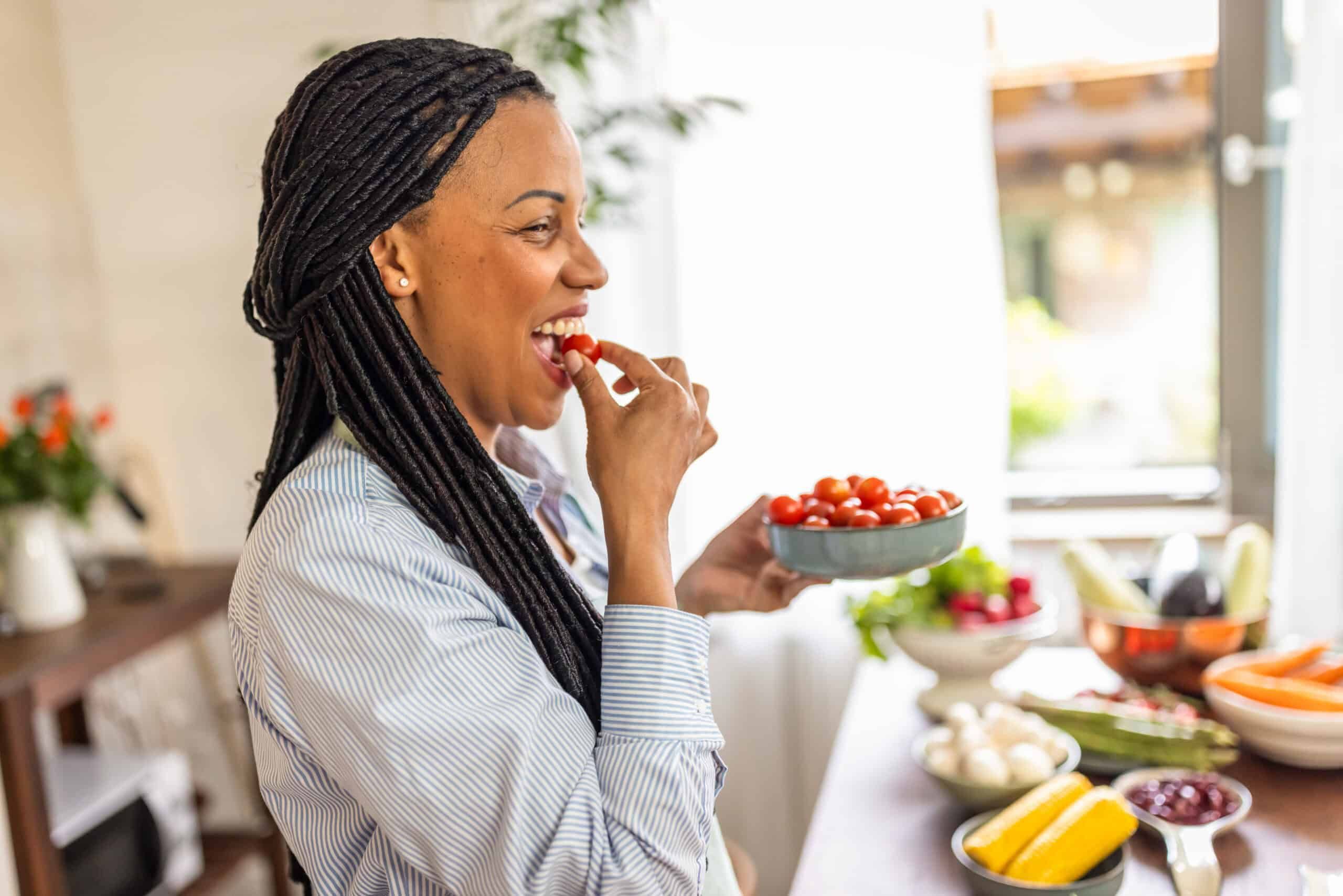 Woman eating fruits and vegetables