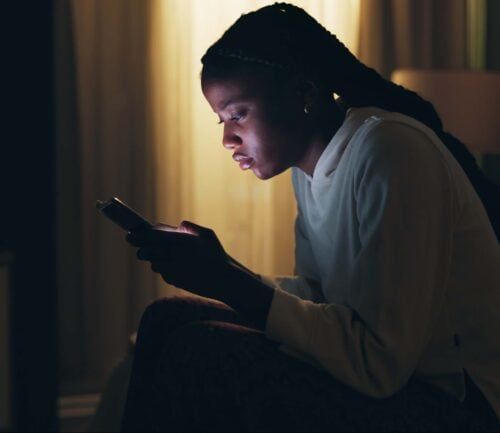 A woman using her phone