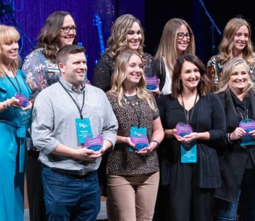 Leader's Choice Award winners posing with their awards