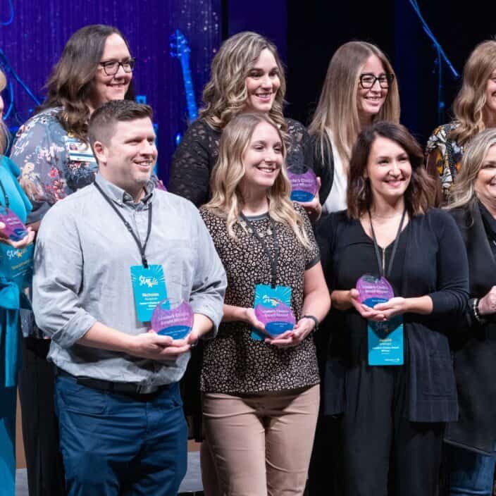 Leader's Choice Award winners posing with their awards