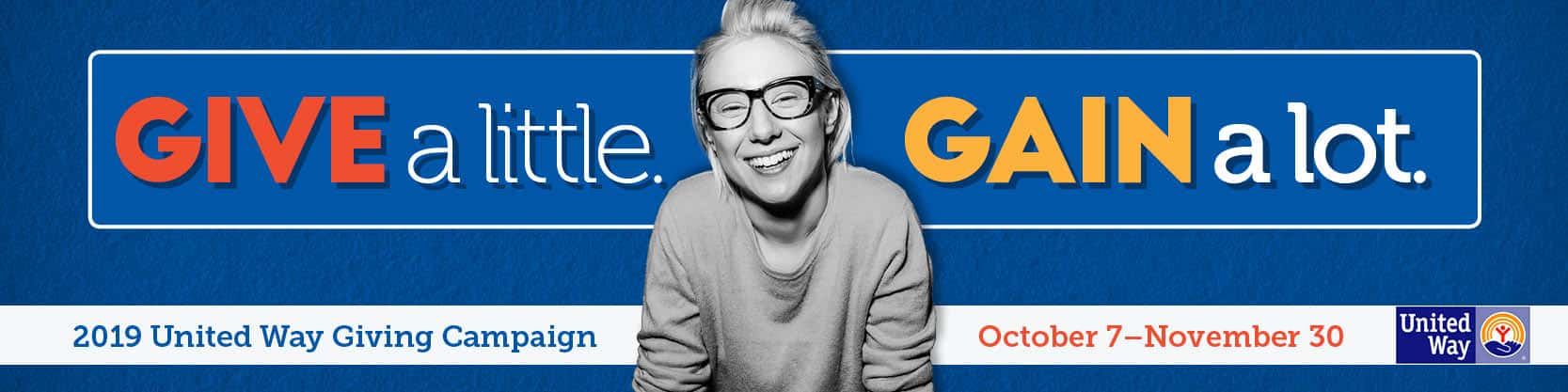 Woman with glasses smiling next to "Give a little. Gain a lot" United Way campaign banner.