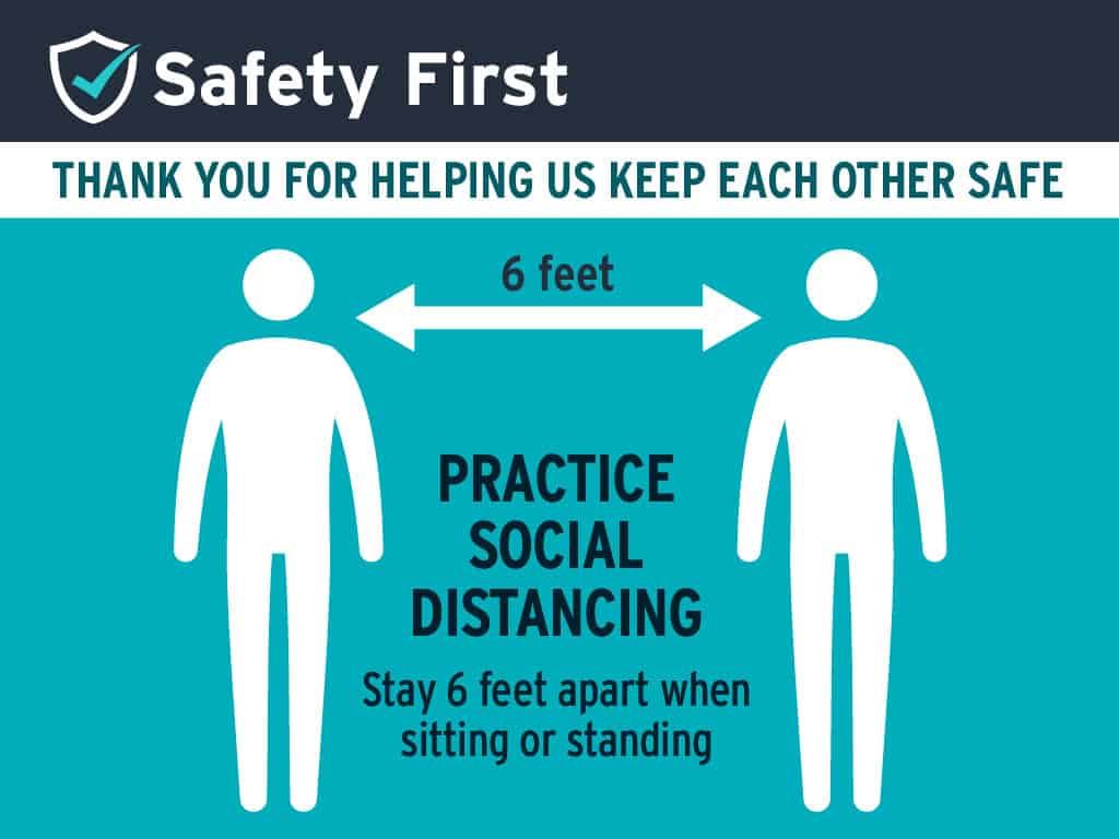 Safety first social distancing sign showing two people 6 feet apart