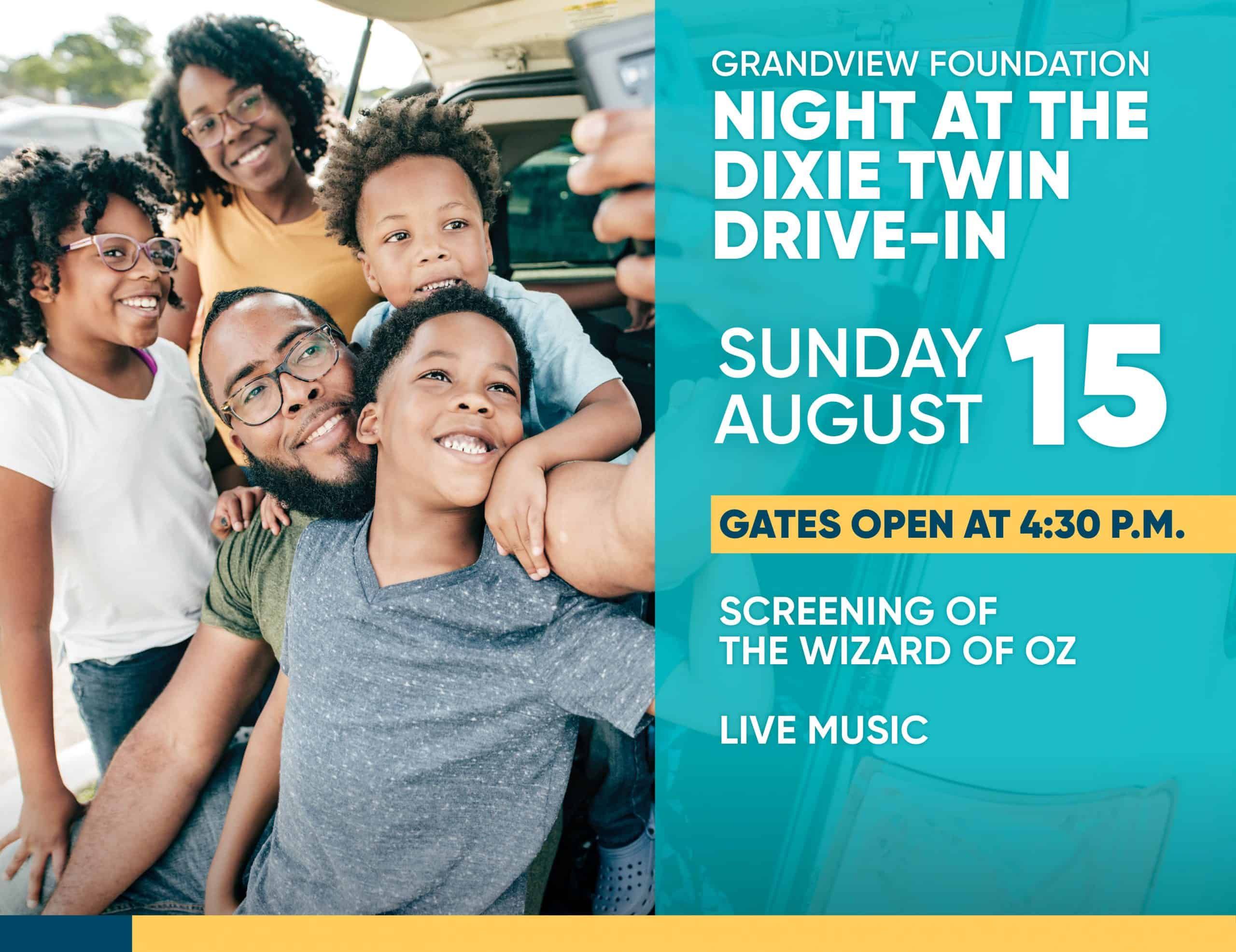 Happy family with children taking selfie in car at drive-in movie event