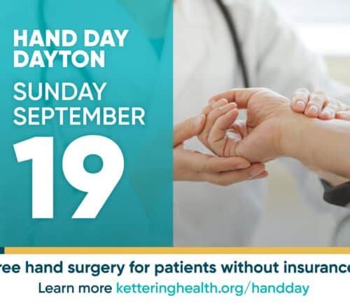 Healthcare provider examining patient's hand for Hand Day Dayton September 19 event