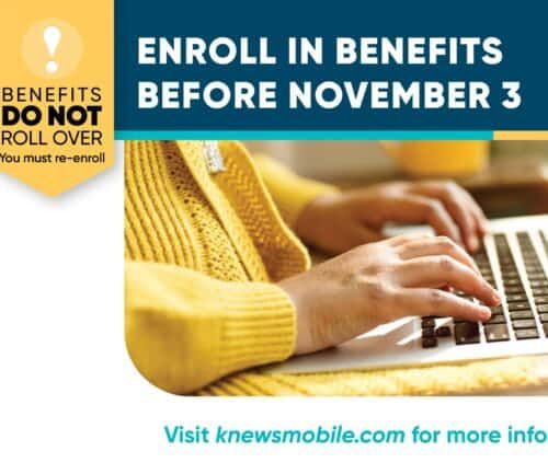 Person in yellow sweater typing on laptop with benefits enrollment deadline reminder