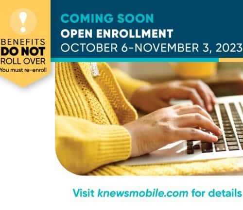 Hands typing on laptop with open enrollment announcement October 6-November 3, 2023