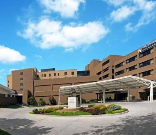 Fort Hamilton Hospital exterior with modern brick building and covered entrance canopy