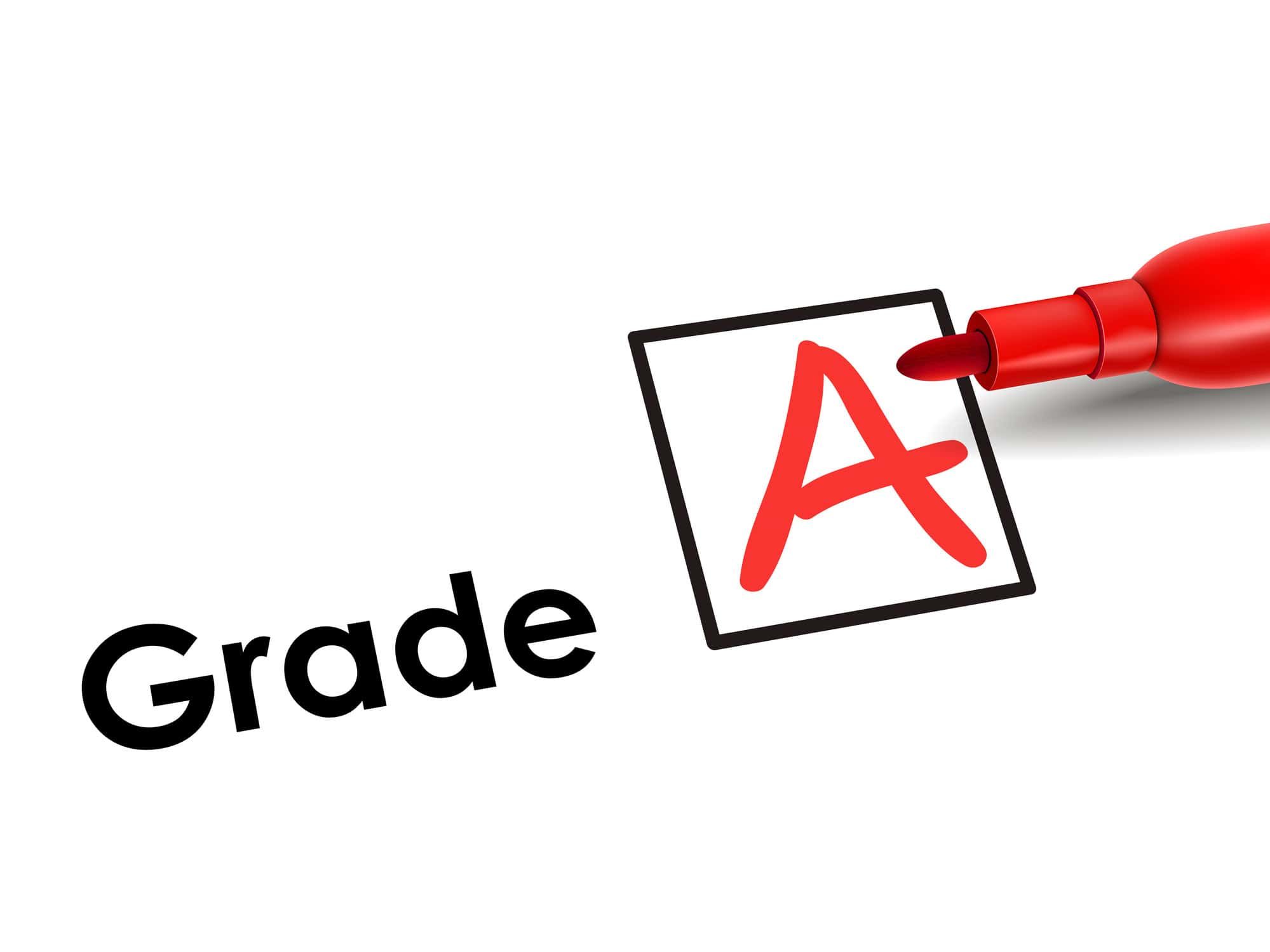 Red marker writing letter A in black-outlined box next to word "Grade"
