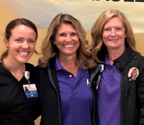 Three healthcare professionals posing together at Kettering Health medical facility