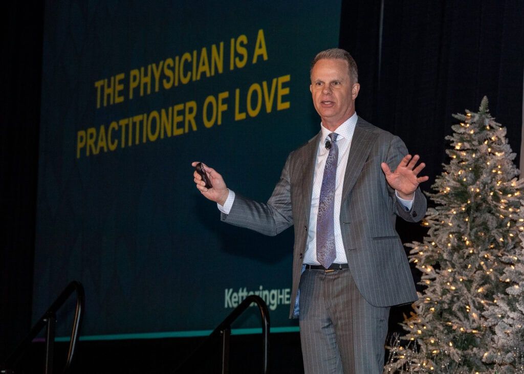 Ty Gibson speaking from the stage